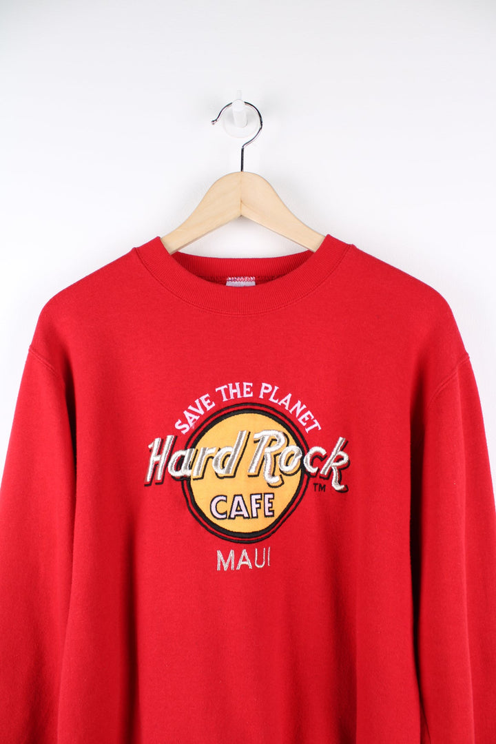 Red Hard Rock Cafe Maui sweatshirt with embroidered logo across the chest.