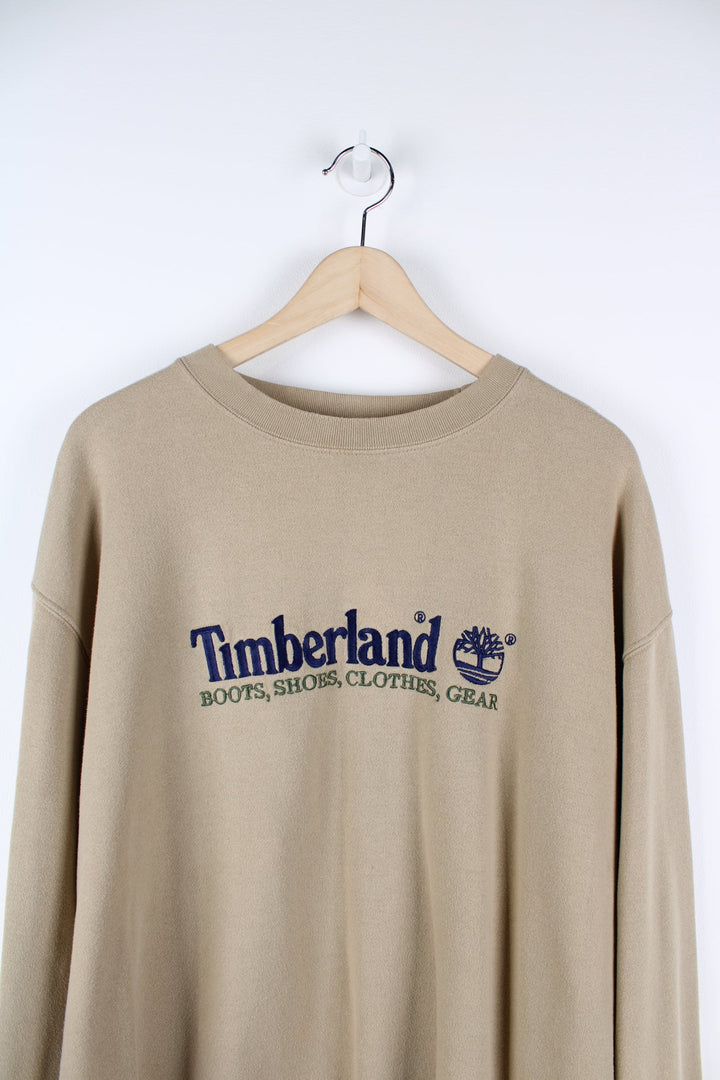 Beige 90s Timberland sweatshirt with embroidered logo across the chest.