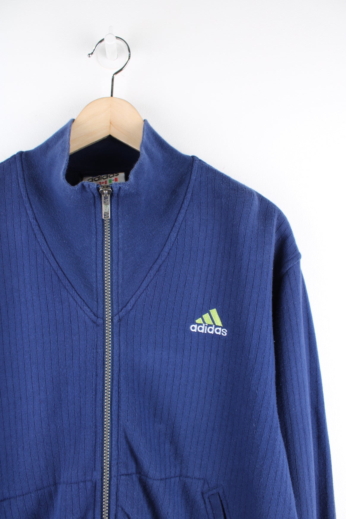 Vintage Adidas blue zip through sweatshirt with embroidered logo on the chest.