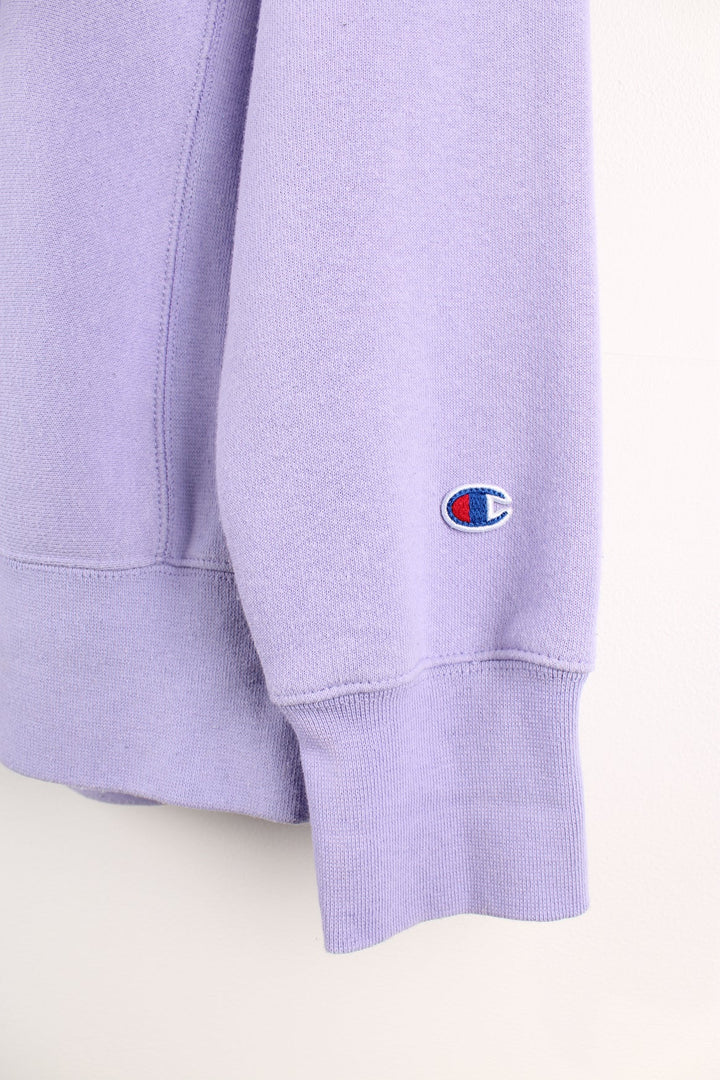 Purple Champion Reverse Weave sweatshirt with embroidered logo across the chest.