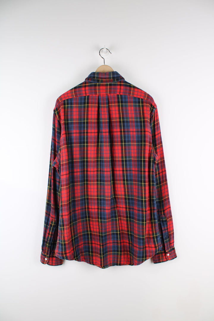 Ralph Lauren red plaid, button up flannel shirt with signature embroidered logo on the chest.