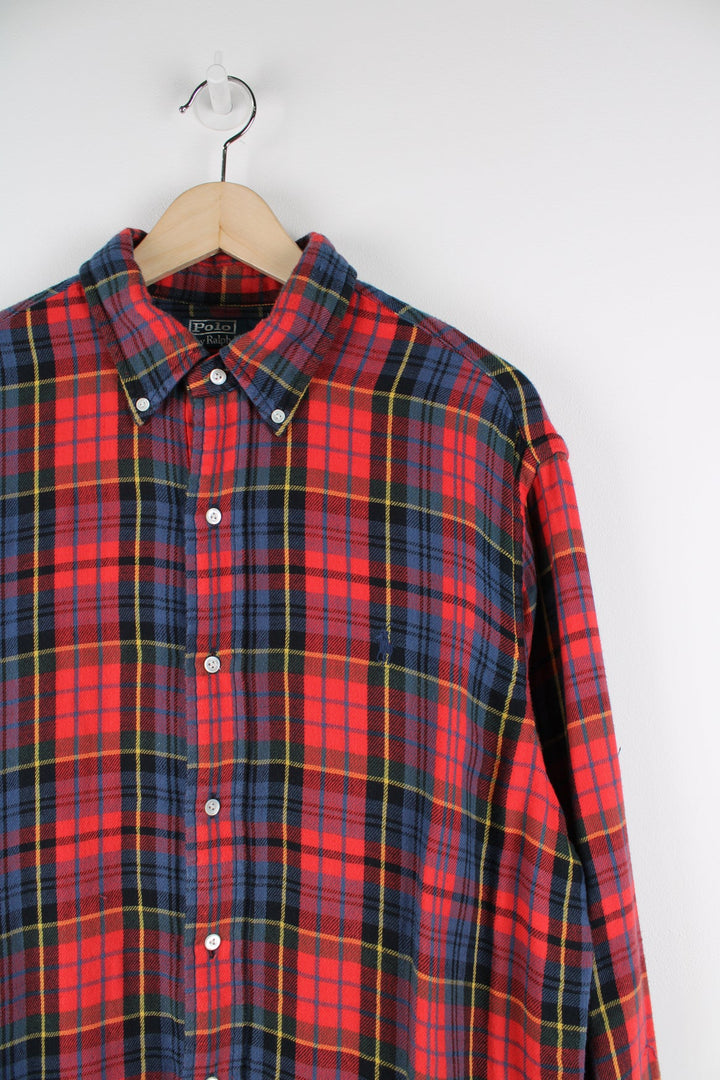 Ralph Lauren red plaid, button up flannel shirt with signature embroidered logo on the chest.