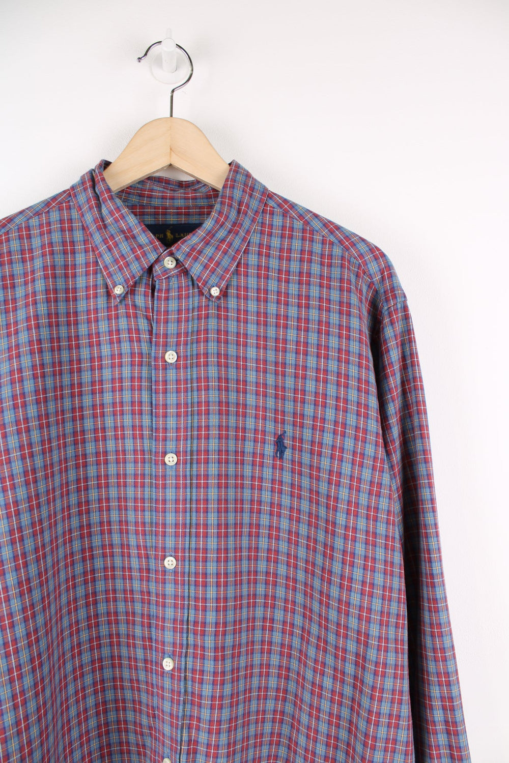 Red and blue Ralph Lauren plaid button up shirt with signature embroidered logo on the chest.