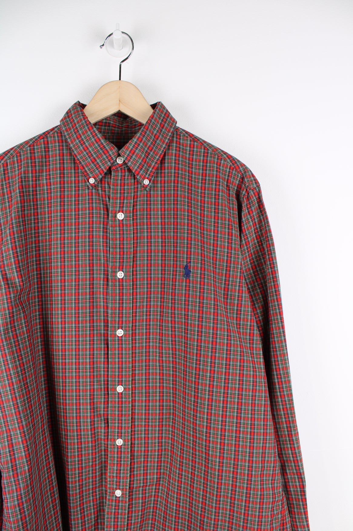 Ralph Lauren red and green plaid button up shirt with signature embroidered logo on the chest.