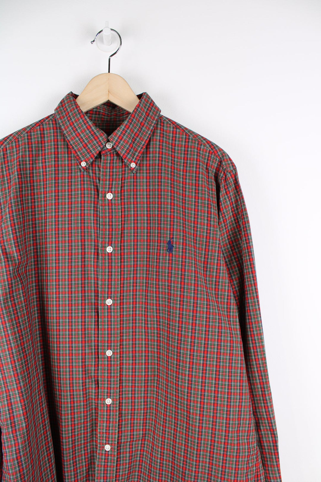 Ralph Lauren red and green plaid button up shirt with signature embroidered logo on the chest.