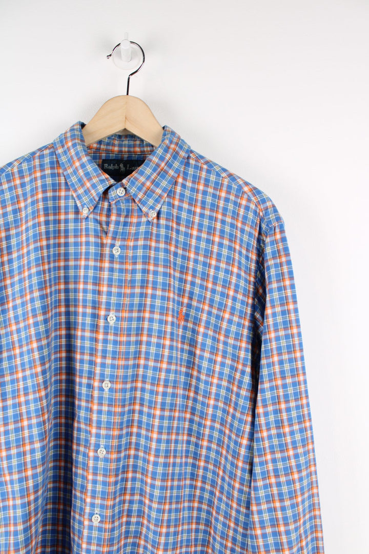 Ralph Lauren blue and orange plaid shirt with embroidered logo on the chest.