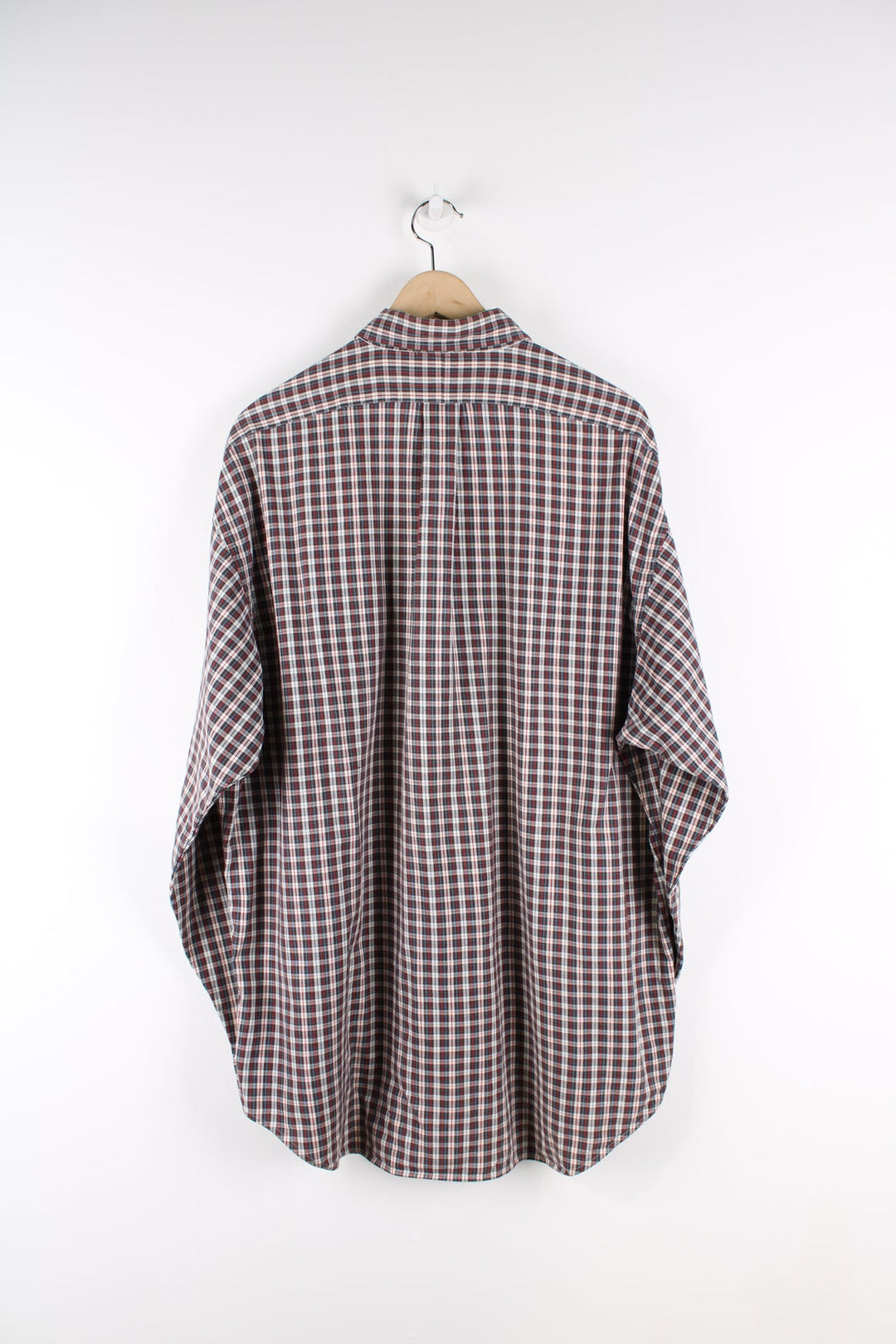 Ralph Lauren check button up shirt featuring signature embroidered logo and pocket on the chest.