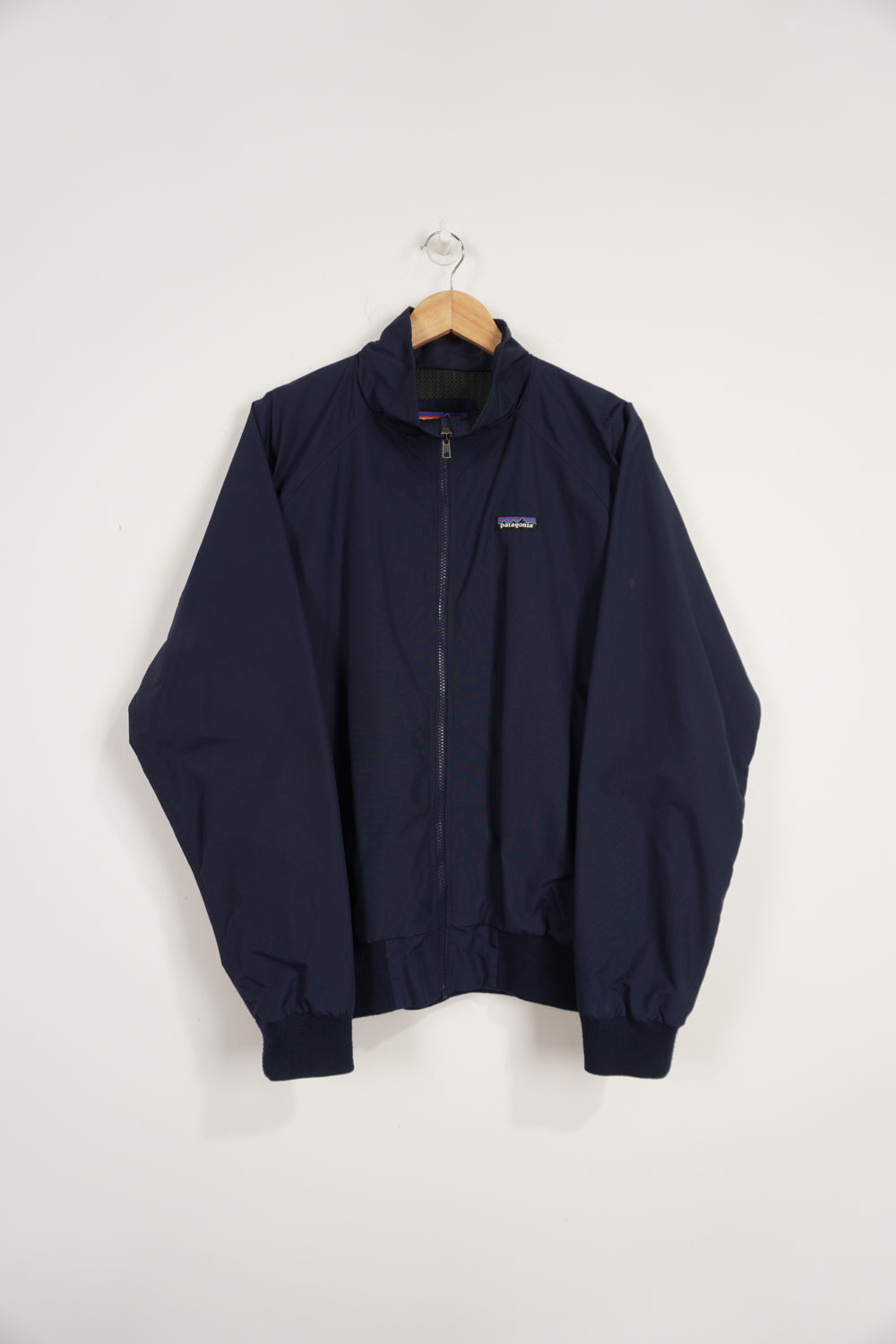 Navy blue Patagonia zip through lightweight jacket with embroidered logo on the chest