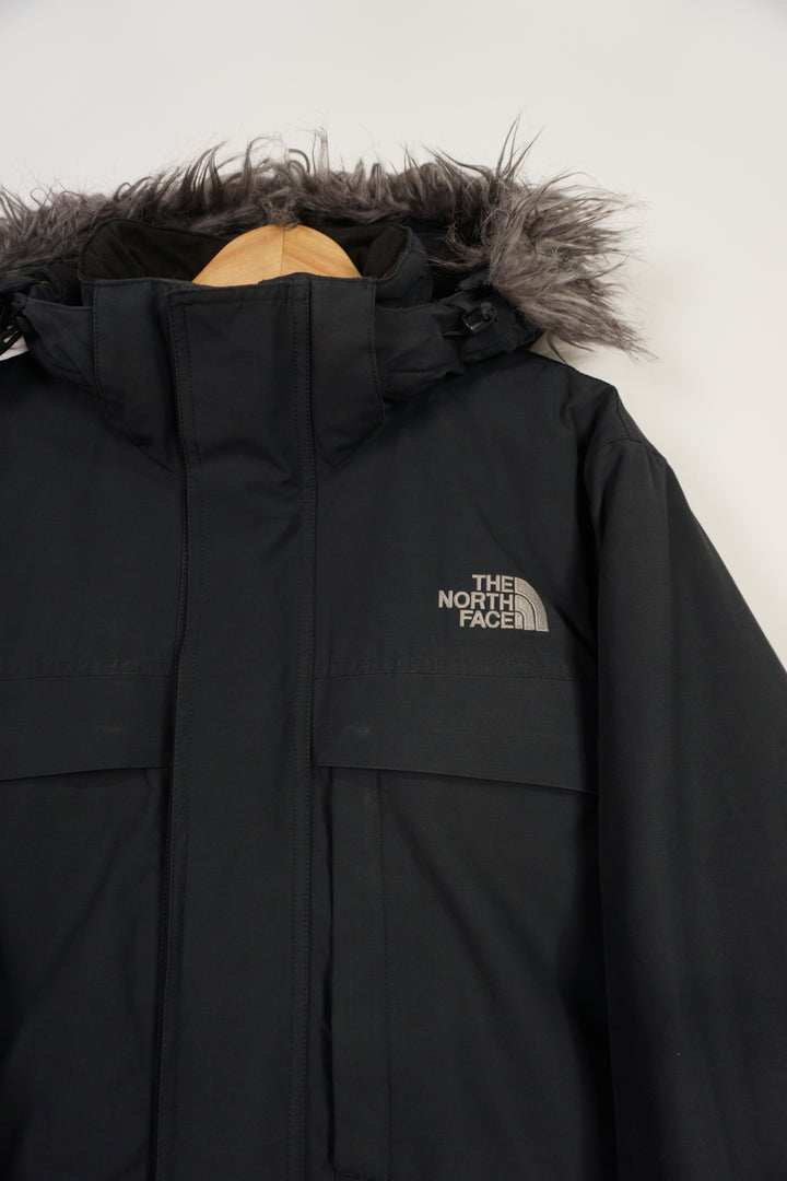 All black The North Face zip through HyVent jacket with embroidered logo, multiple pockets and detachable hood