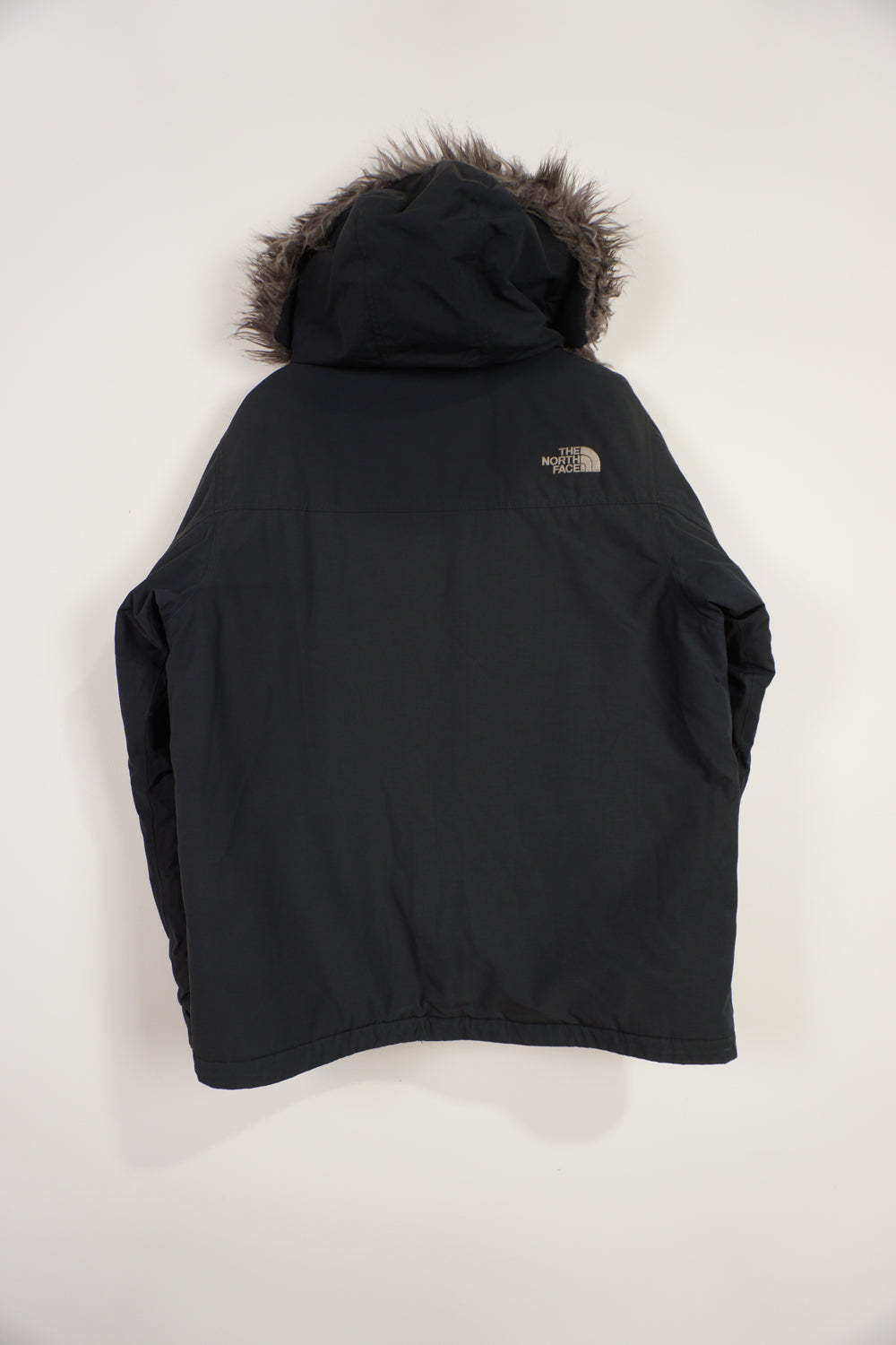 All black The North Face zip through HyVent jacket with embroidered logo, multiple pockets and detachable hood