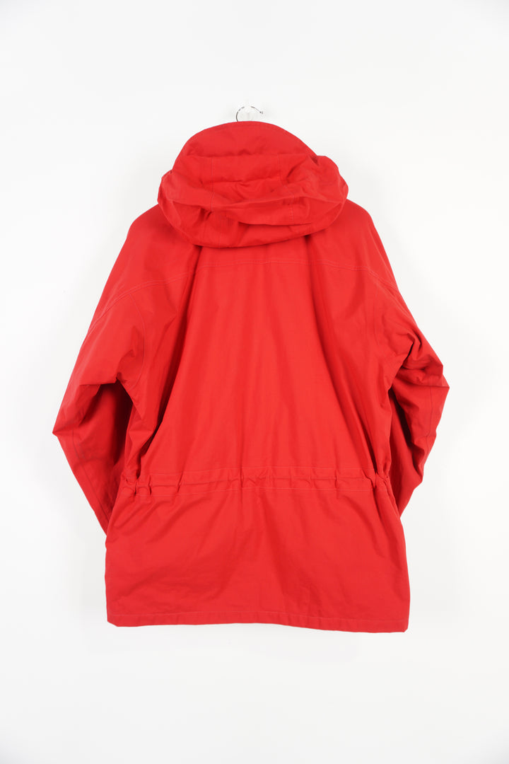 Berghaus red zip through waterproof jacket with removable fleece lining and draw string waist, embroidered logo on the chest and foldaway hood