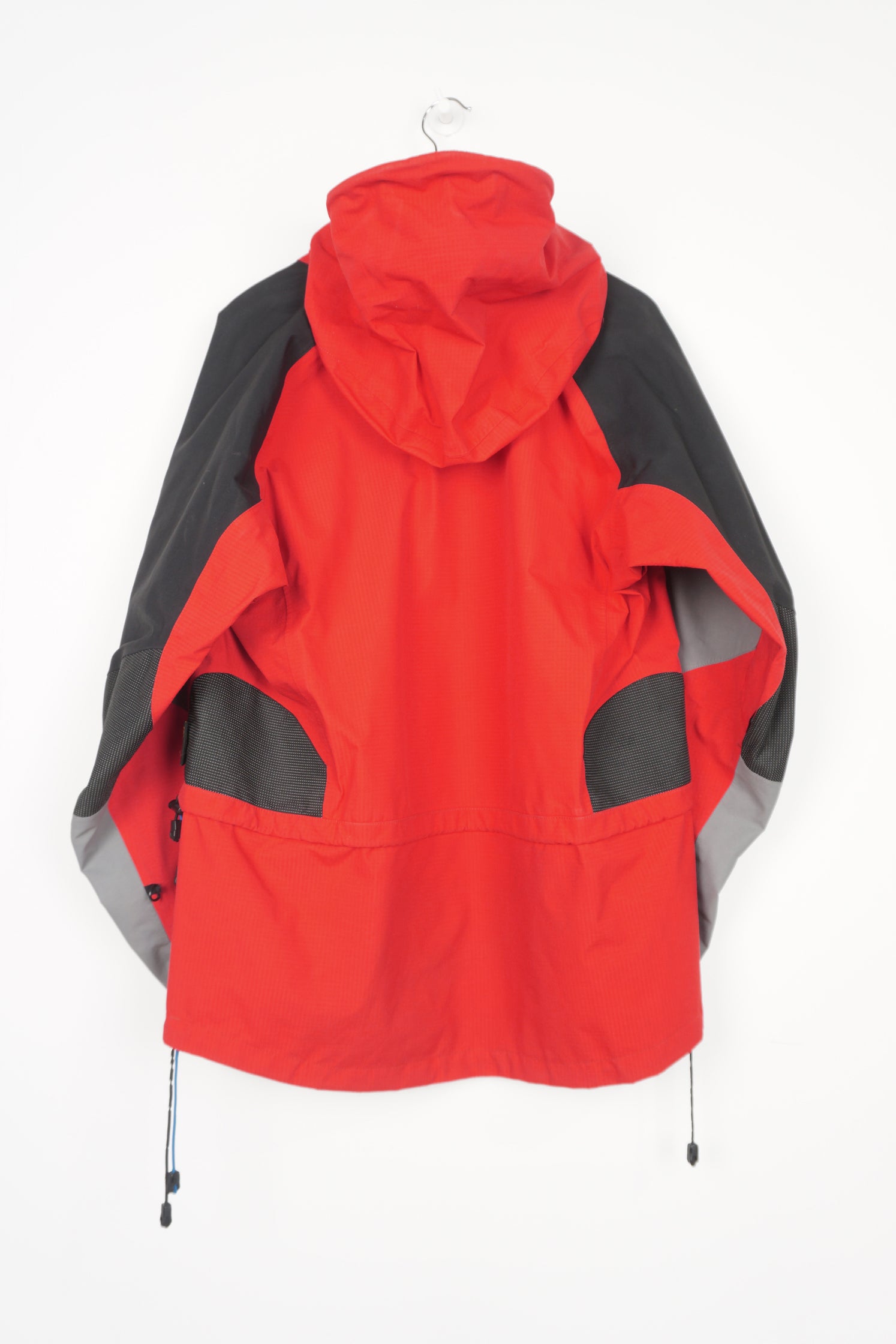 Berghaus red and black zip through waterproof jacket with draw string waist,  embroidered logo on the chest and roll up hood