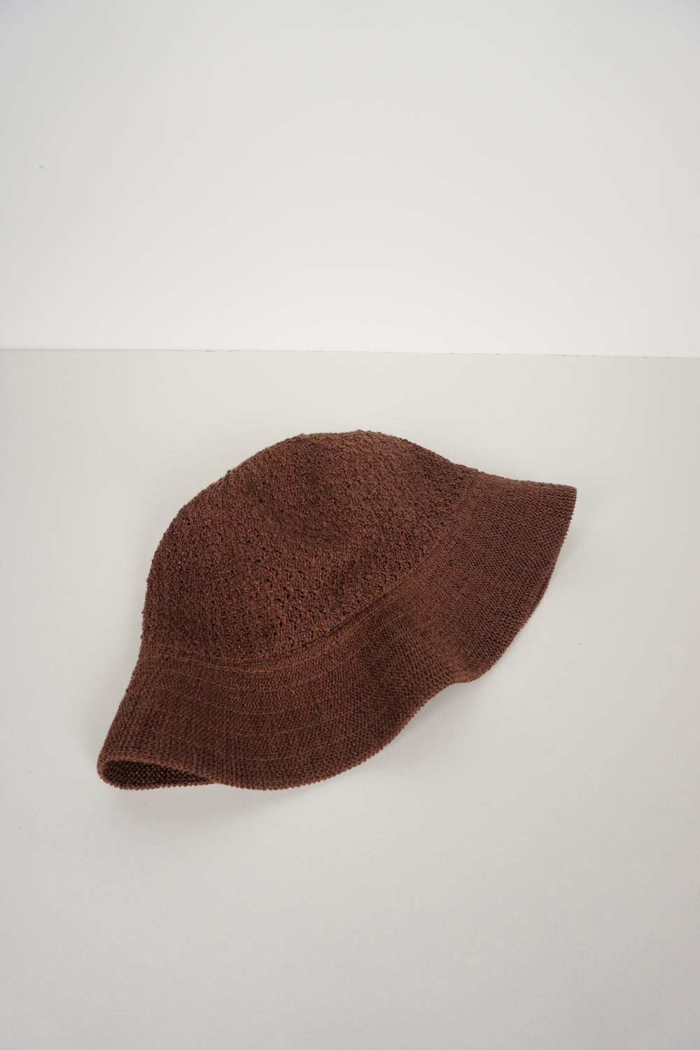 Vintage brown Kangol bucket hat with embroidered logo on the front