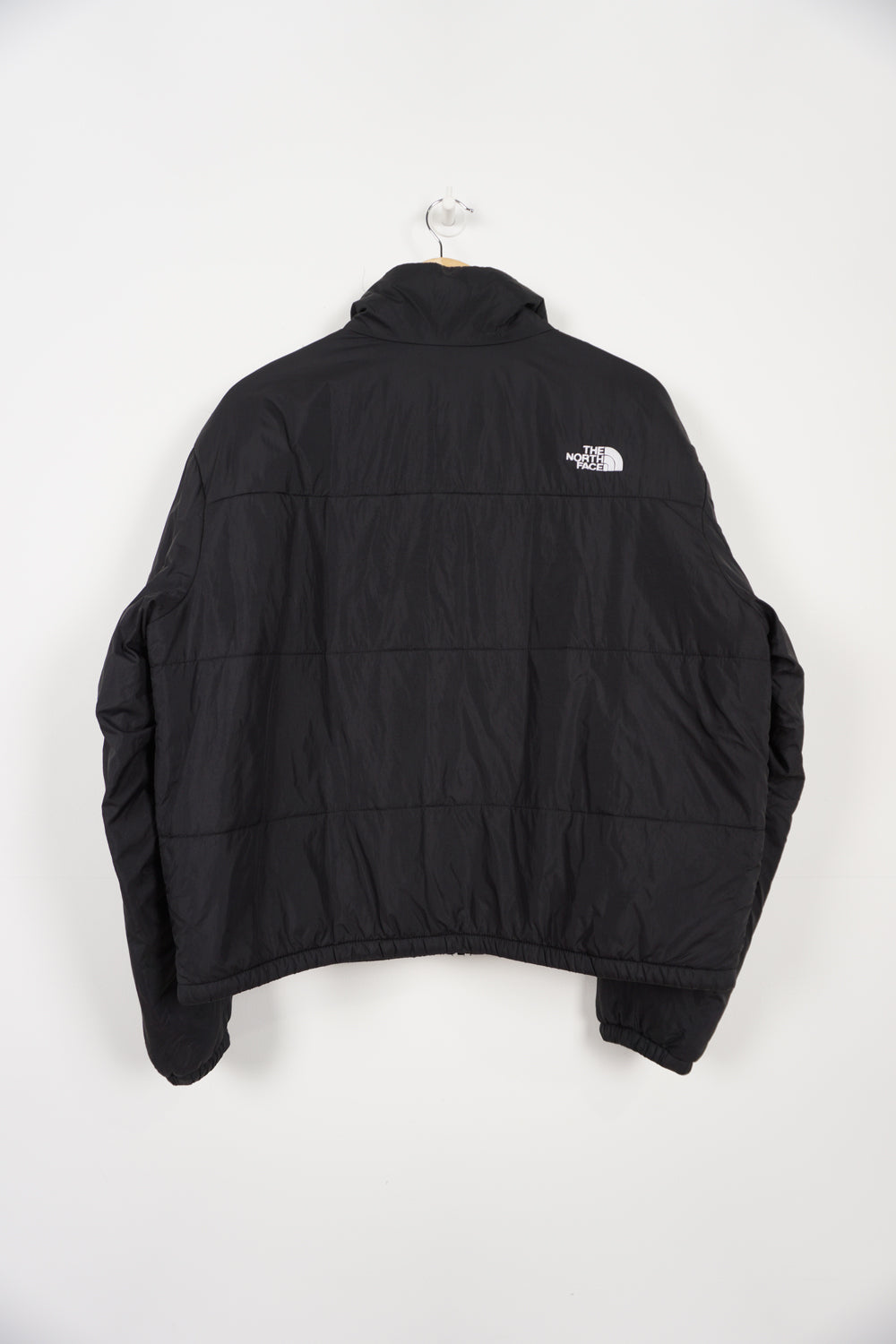 black The North Face lightweight padded jacket embroidered logo on the front and back 