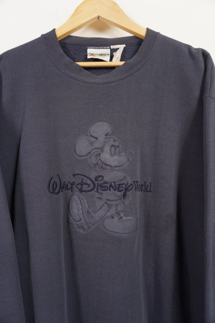 Vintage Disney faded navy blue crewneck sweatshirt with embossed Mickey Mouse and embroidered text