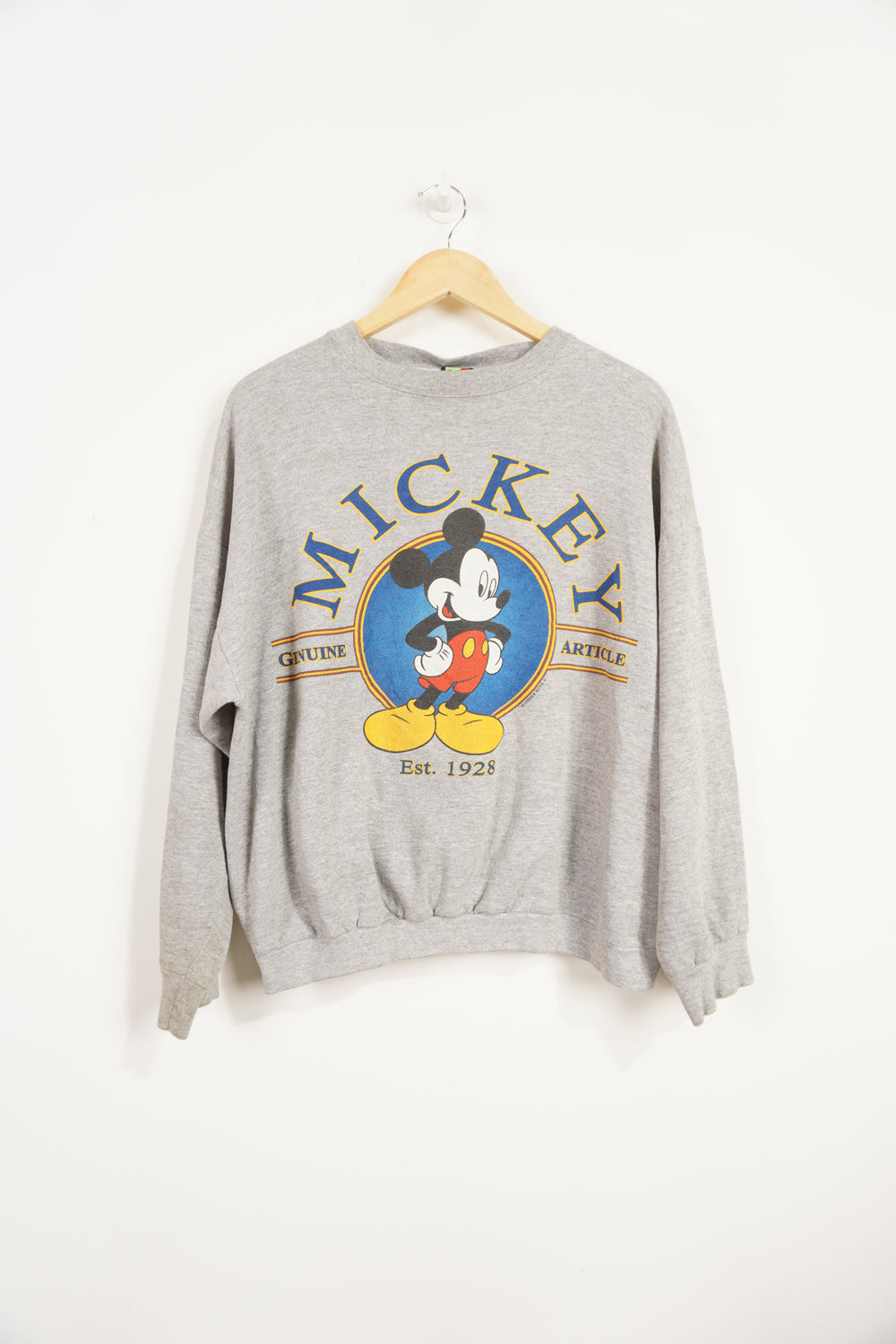 Vintage Disney Mickey Mouse graphic sweatshirt with printed graphic good condition, slight cracking on print Size in Label: N/A - fits like a Medium, slightly boxier fit 