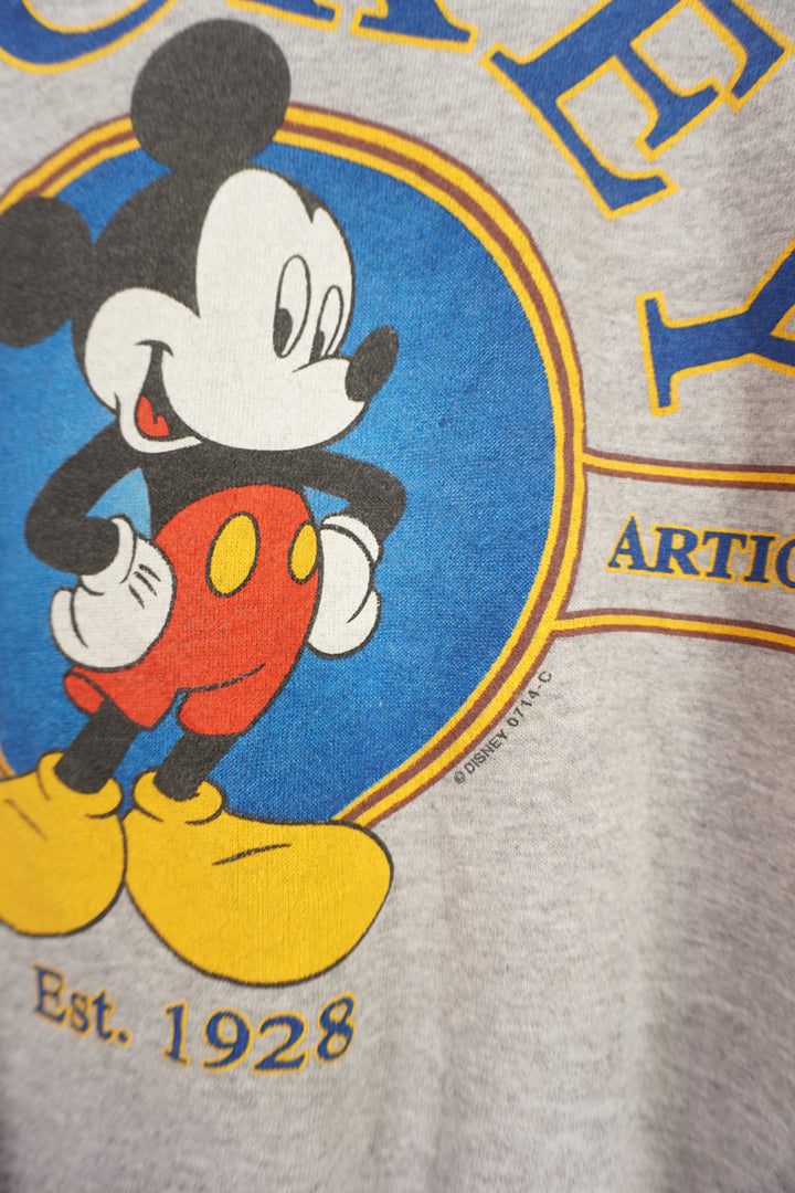 Vintage Disney Mickey Mouse graphic sweatshirt with printed graphic good condition, slight cracking on print Size in Label: N/A - fits like a Medium, slightly boxier fit 