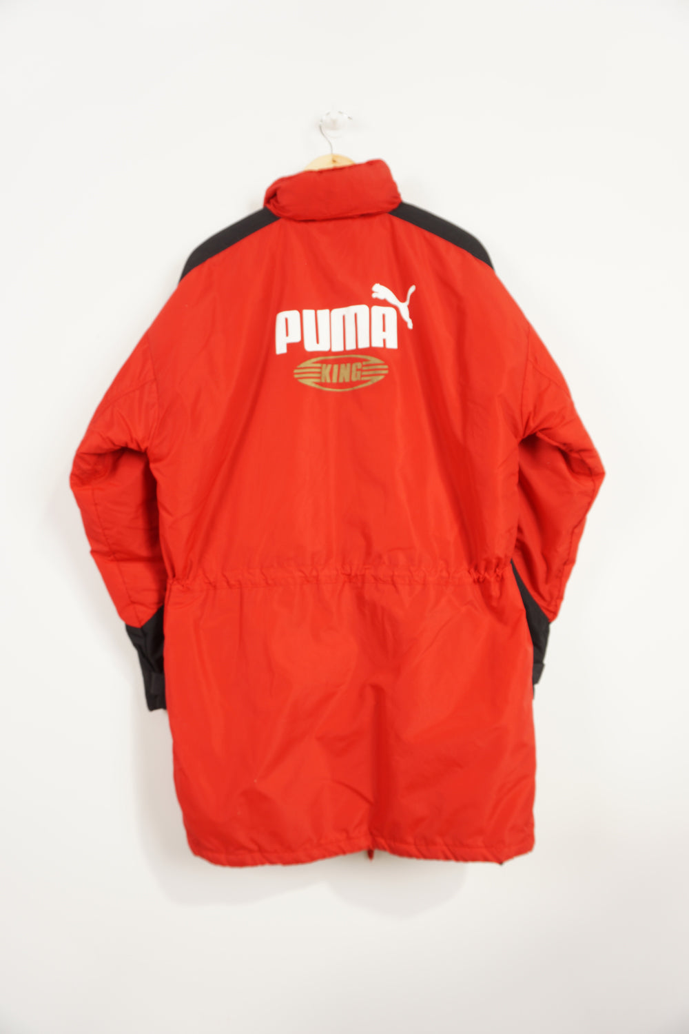 Vintage 90s Red Puma King puffer coat with embroidered logo on the chest, foldaway hood, and printed logo graphic on reverse good condition: Size in Label: M