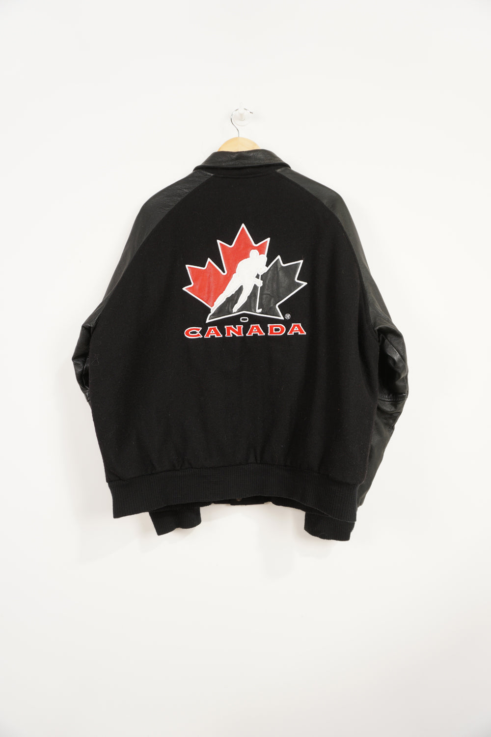 Team Canada x Nike black wool bomber jacket with leather sleeves and embroidered logos 