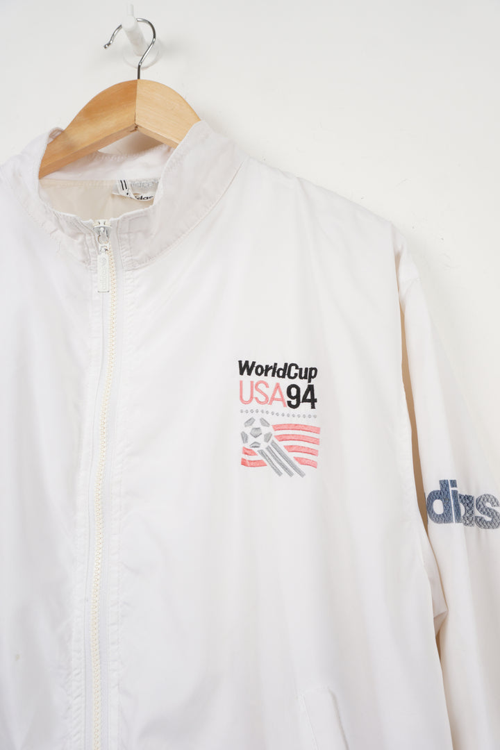 World Cup USA 94 Tracksuit Top by adidas in white with embroidered spell-out and graphic on front back and sleeve