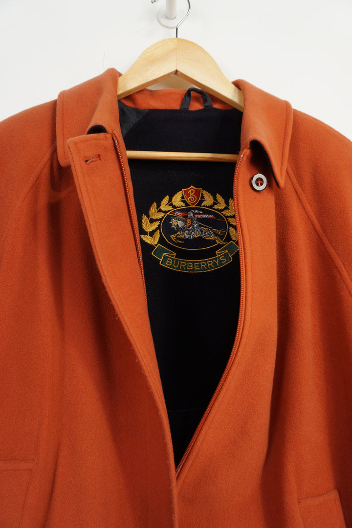 Vintage Burberry orange wool jacket with quilted lining. Made in England label