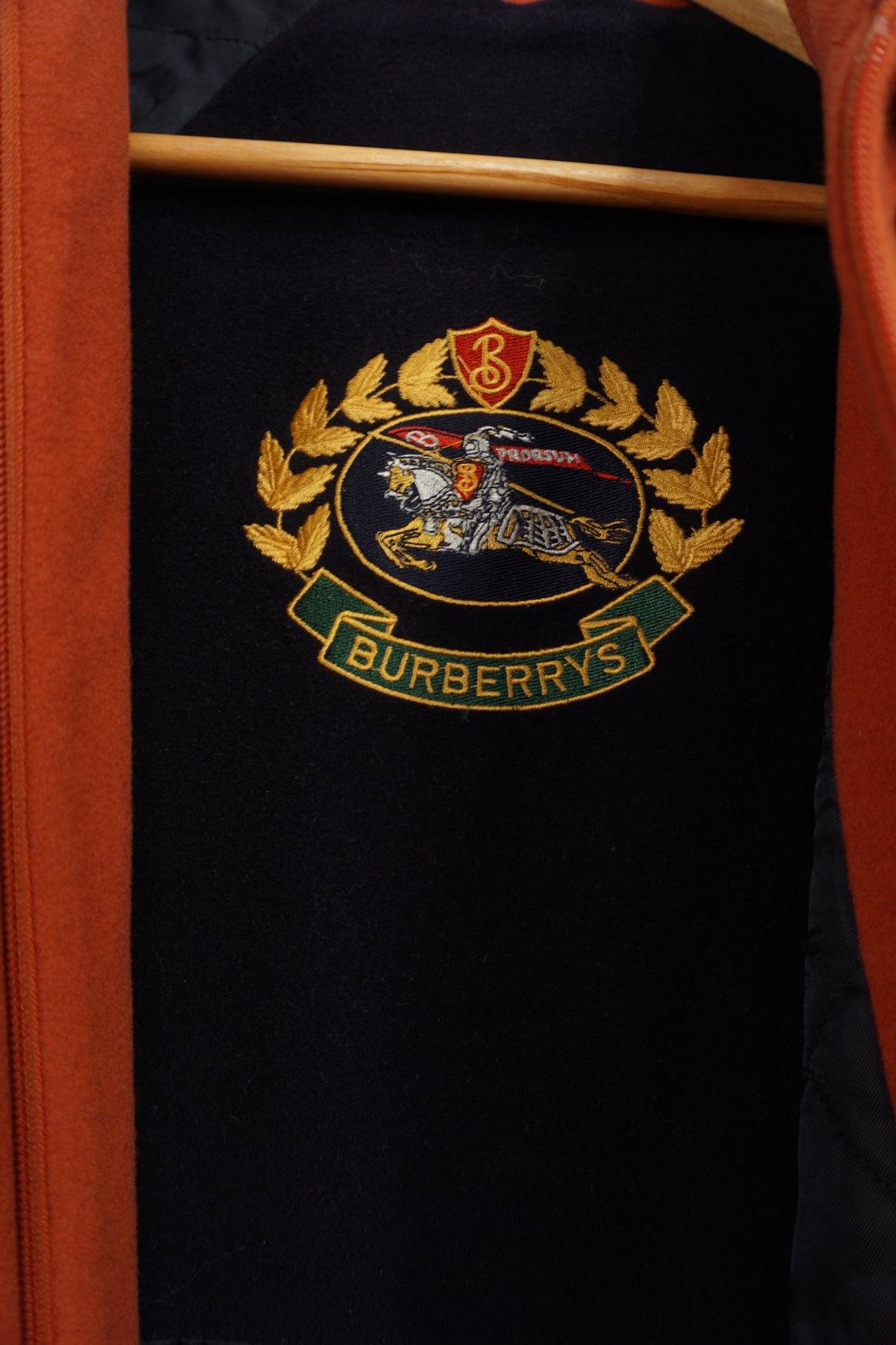 Vintage Burberry orange wool jacket with quilted lining. Made in England label