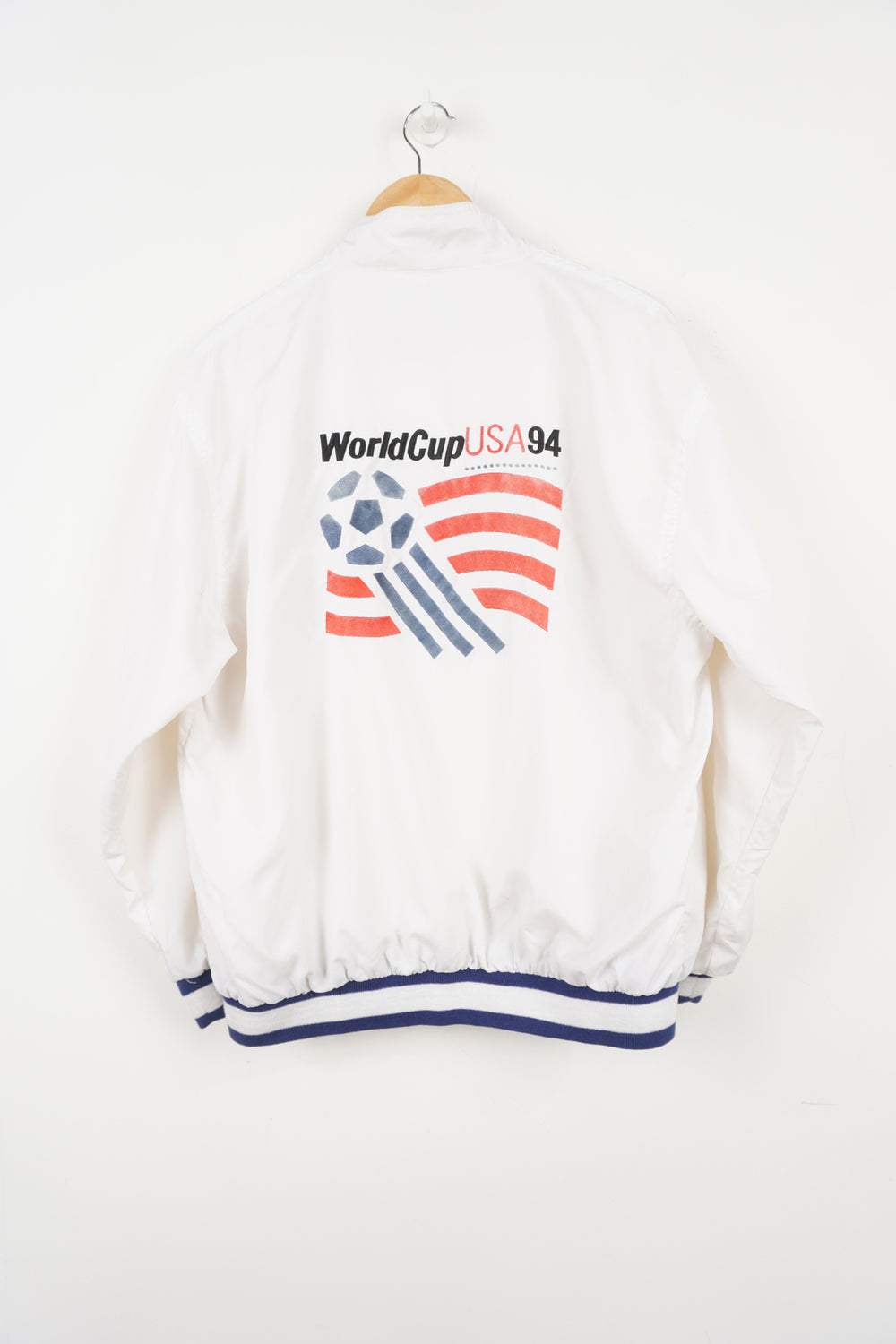 World Cup USA 94 Tracksuit Top by adidas in white with embroidered spell-out and graphic on front back and sleeve