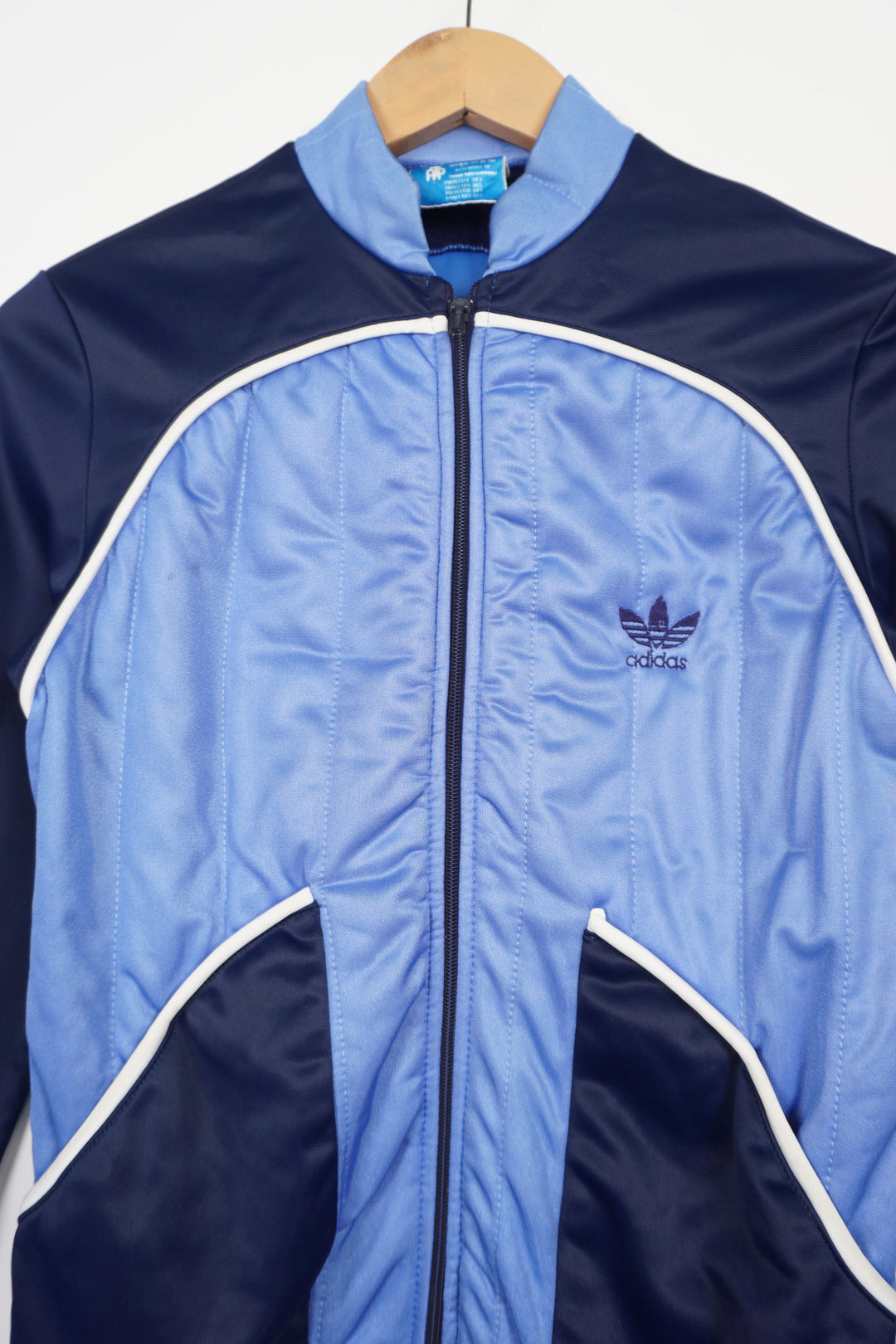 Blue track top with Adidas Ventex logo on the chest