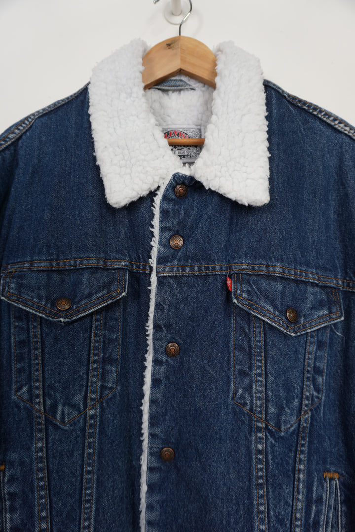 Vintage 90s Levi Strauss button up Sherpa Trucker dark blue denim jacket with red tab