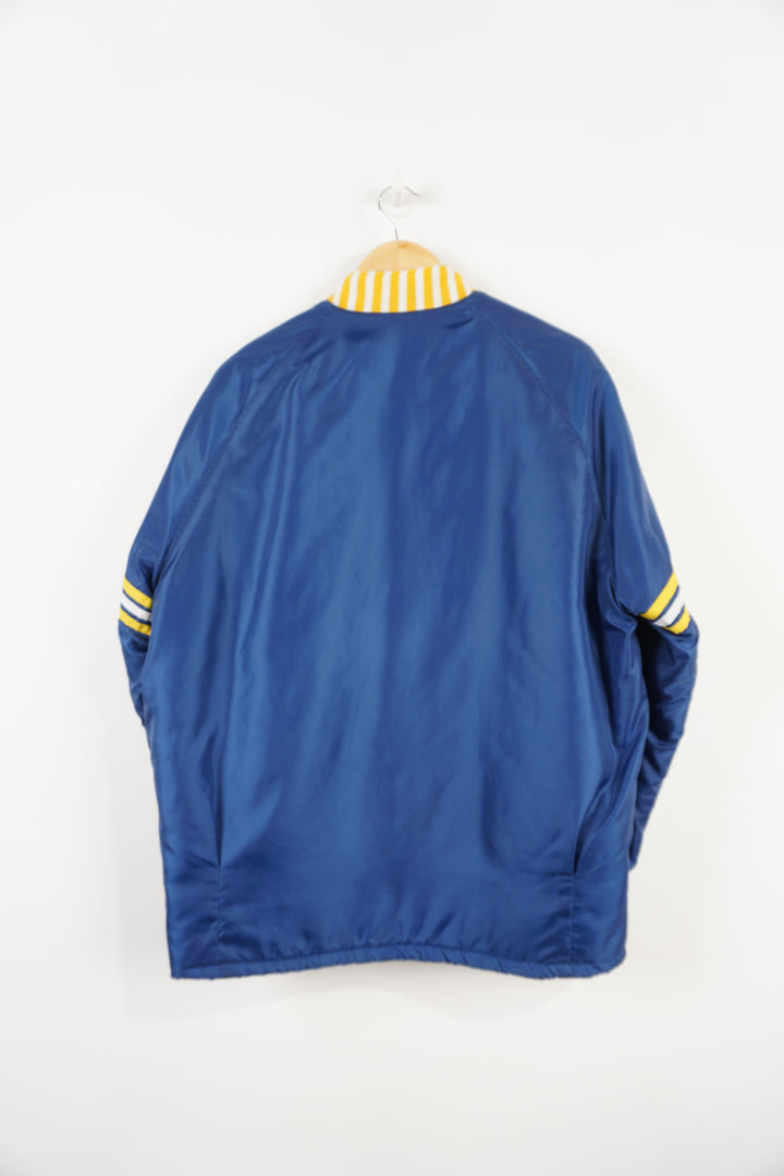 Vintage 1970s/80s blue bomber jacket with embroidered Burlington badges and quilted lining