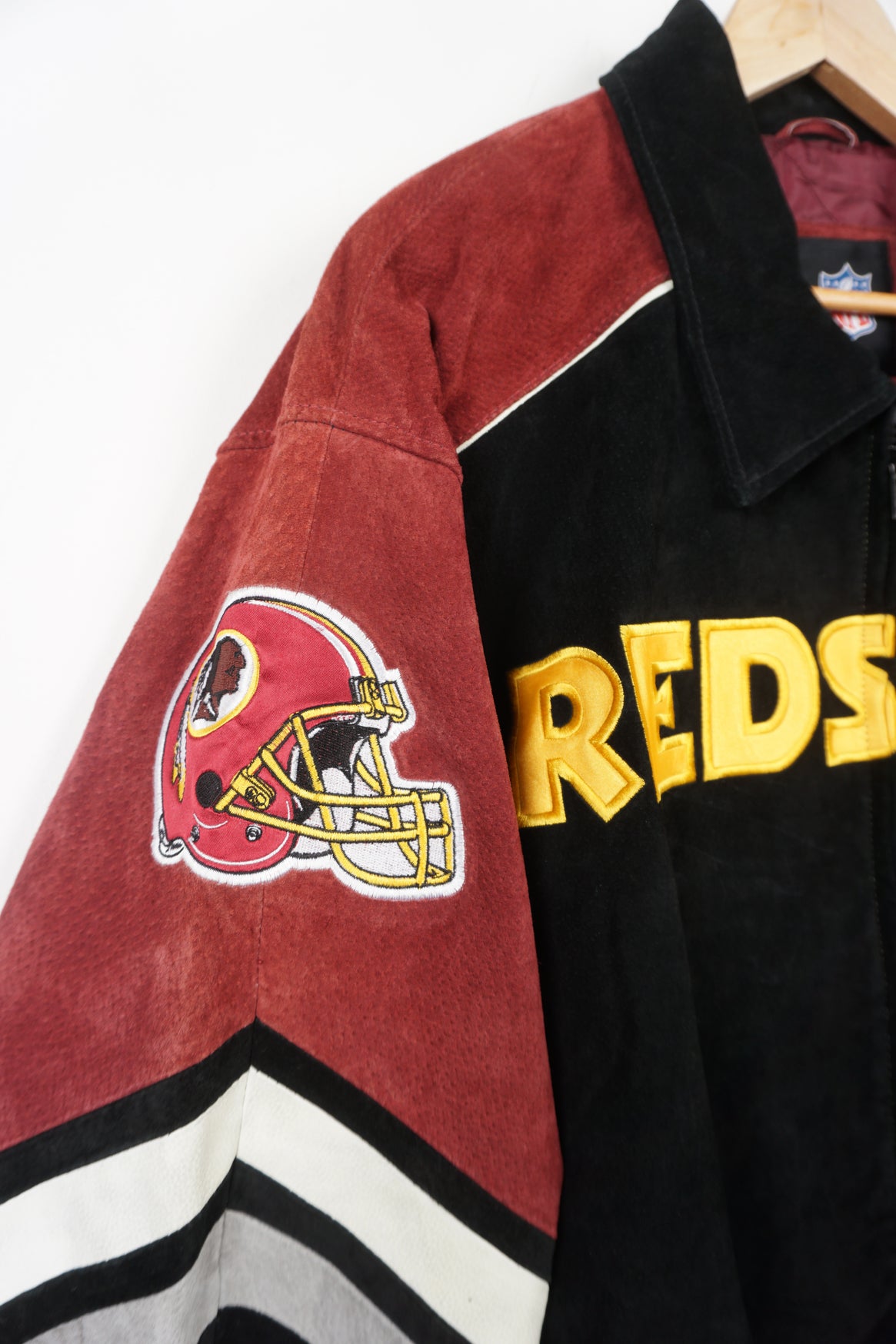 Vintage red and black suede, Washington Red Skins bomber jacket with embroidered details on the front and back