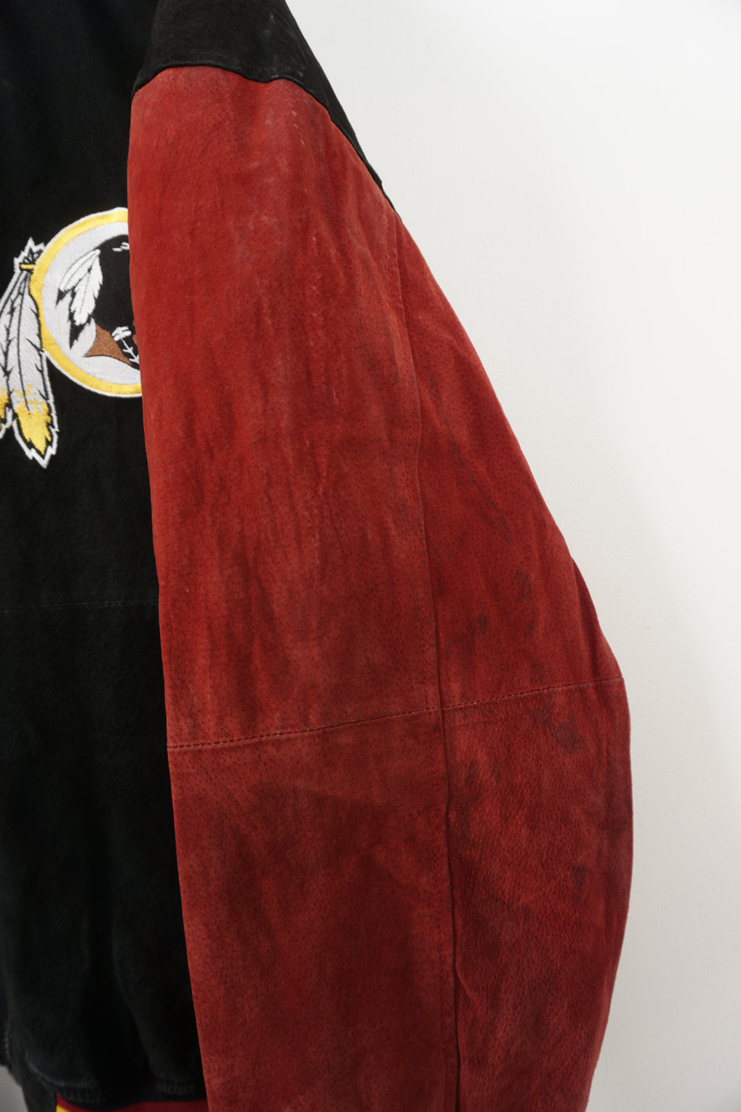 Vintage red and black suede, Washington Red Skins bomber jacket with embroidered details on the front and back