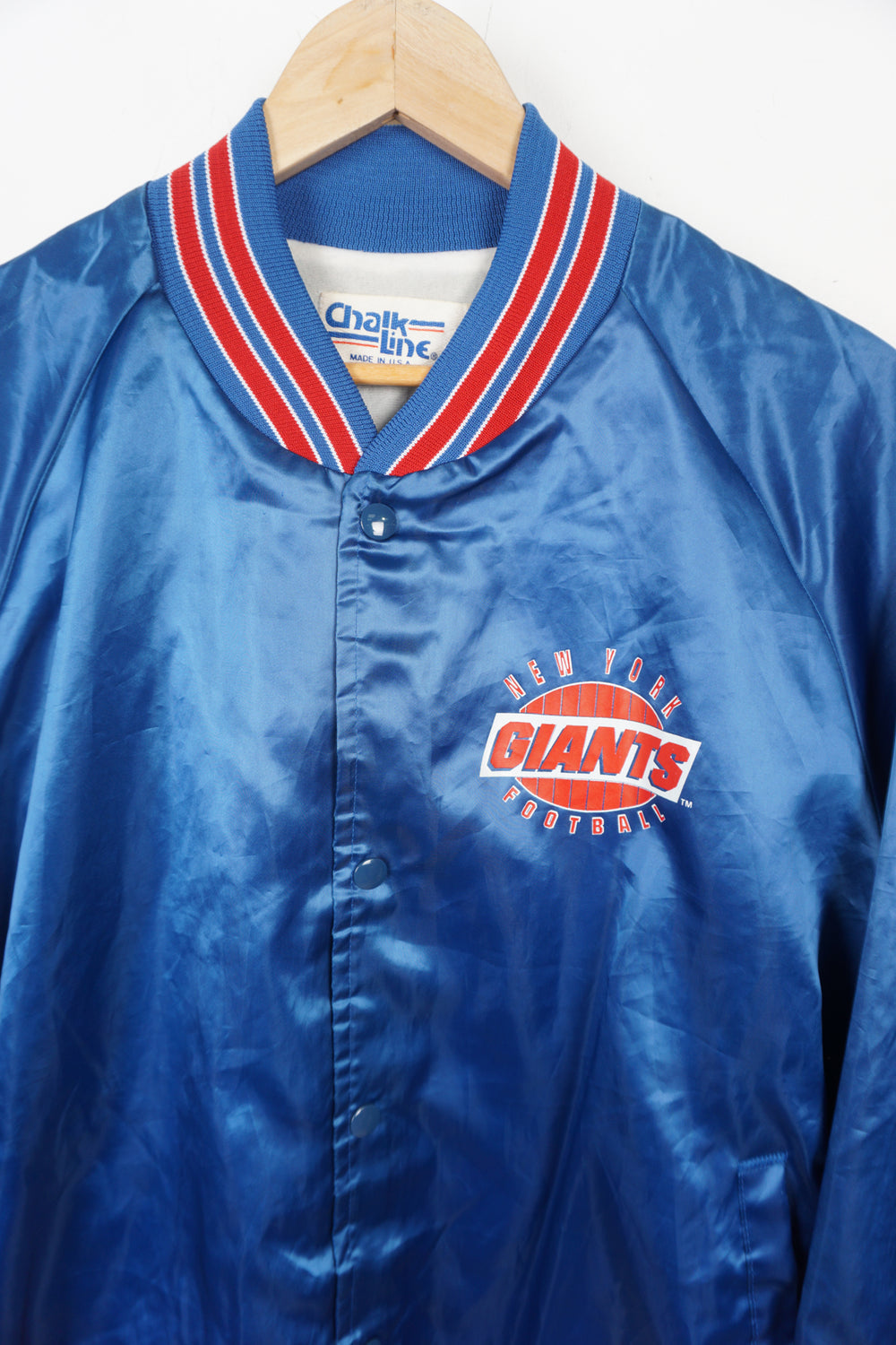 Vintage Chalk Line, New York Giants blue satin bomber jacket with spell-out details on the chest and back 