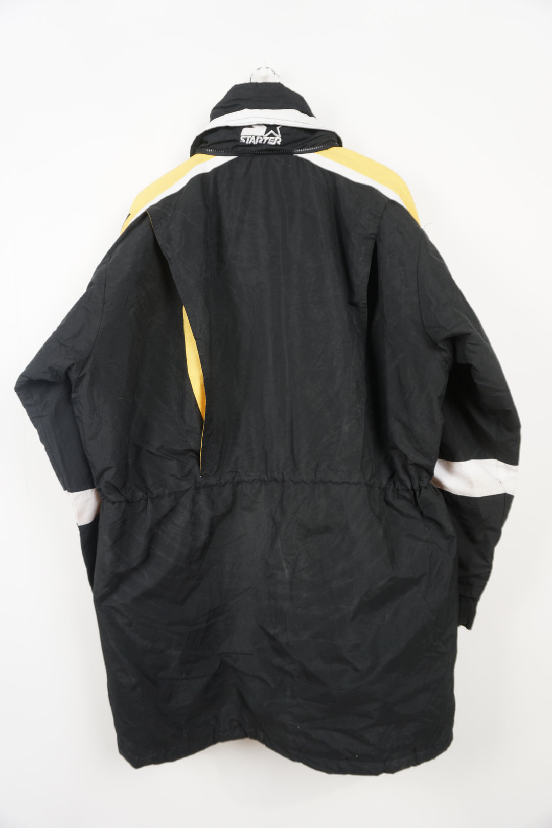 Vintage 90's Pittsburgh Penguins bench coat with embroidered details on the sleeves and chest