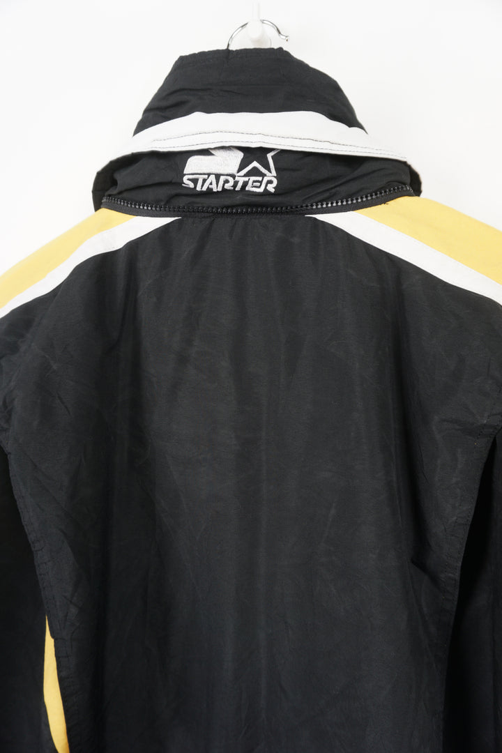 Vintage 90's Pittsburgh Penguins bench coat with embroidered details on the sleeves and chest