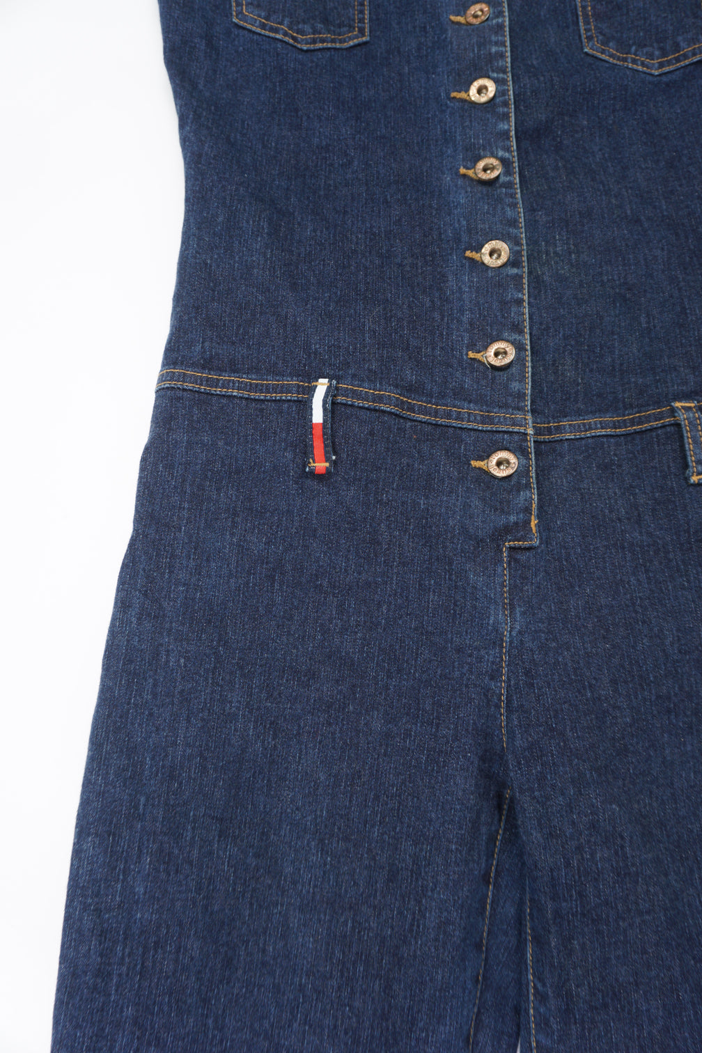 Vintage Tommy Hilfiger button up denim jumpsuit with signature Tommy flag on the belt loop