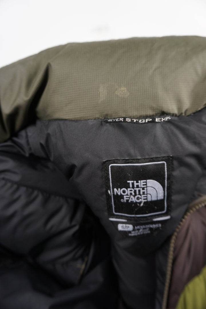 The North Face 700 down gilet with embroidered logos, drawstring hem and double pockets 