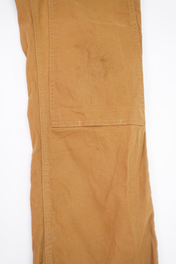 Dickies tan carpenter style jeans with multiple pockets and double knee