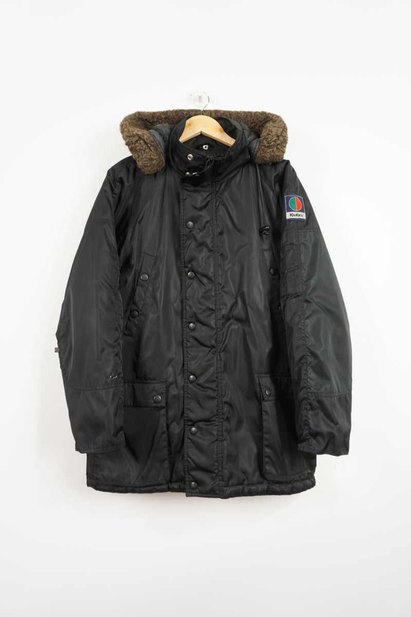 All black Kickers winter coat with detachable hood and embroidered logo on the sleeve