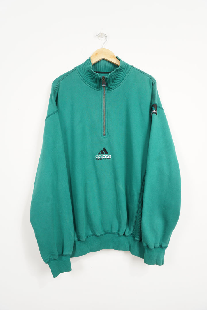 90's Adidas Equipment green 1/4 zip sweatshirt, embroidered logo on the front, and badge on sleeve good condition, small mark of discolouring on front&nbsp; Size in Label: L