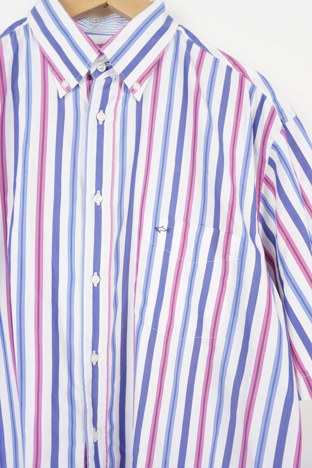 White and purple vertical striped shirt with embroidered Paul & Shark logo on the pocket