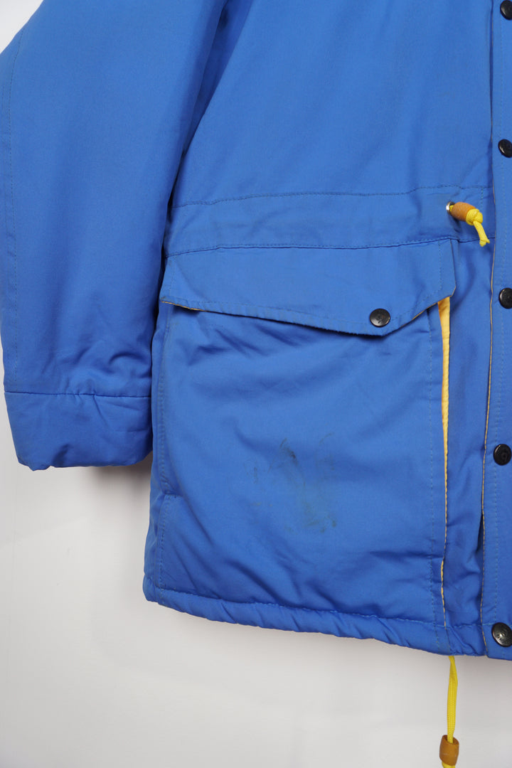 Vintage Berghaus blue Gortex waterproof padded coat with drawstring waist and foldaway hood 