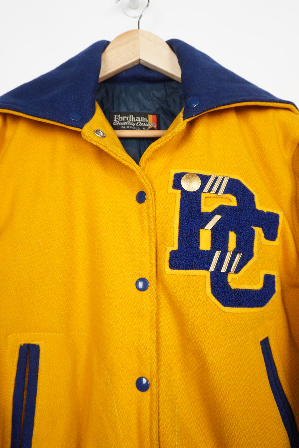 Vintage all yellow wool cheerleading letterman jacket with zip up hood and embroidered lettering