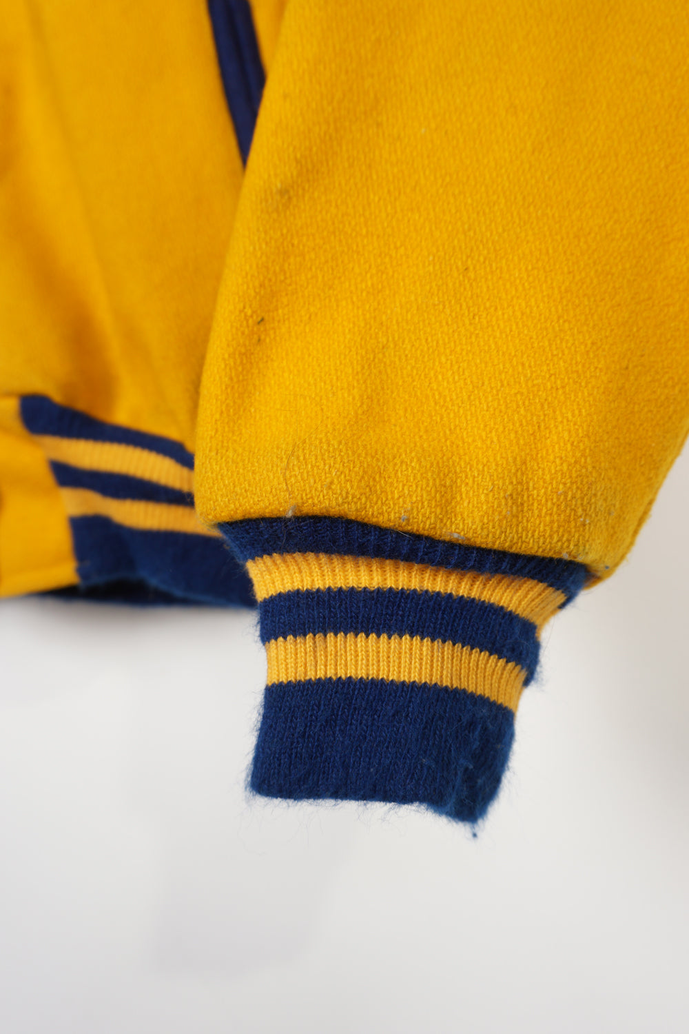 Vintage all yellow wool cheerleading letterman jacket with zip up hood and embroidered lettering