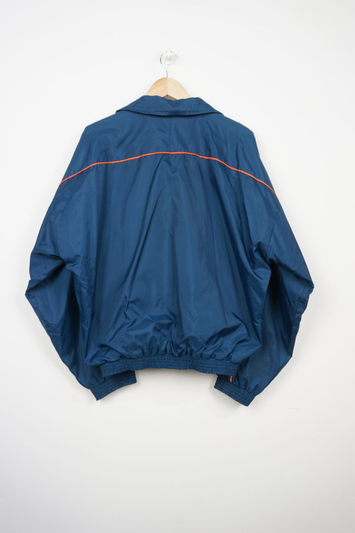 Vintage blue zip through Umbro coat with embroidered logo on the chest and foldaway hood 