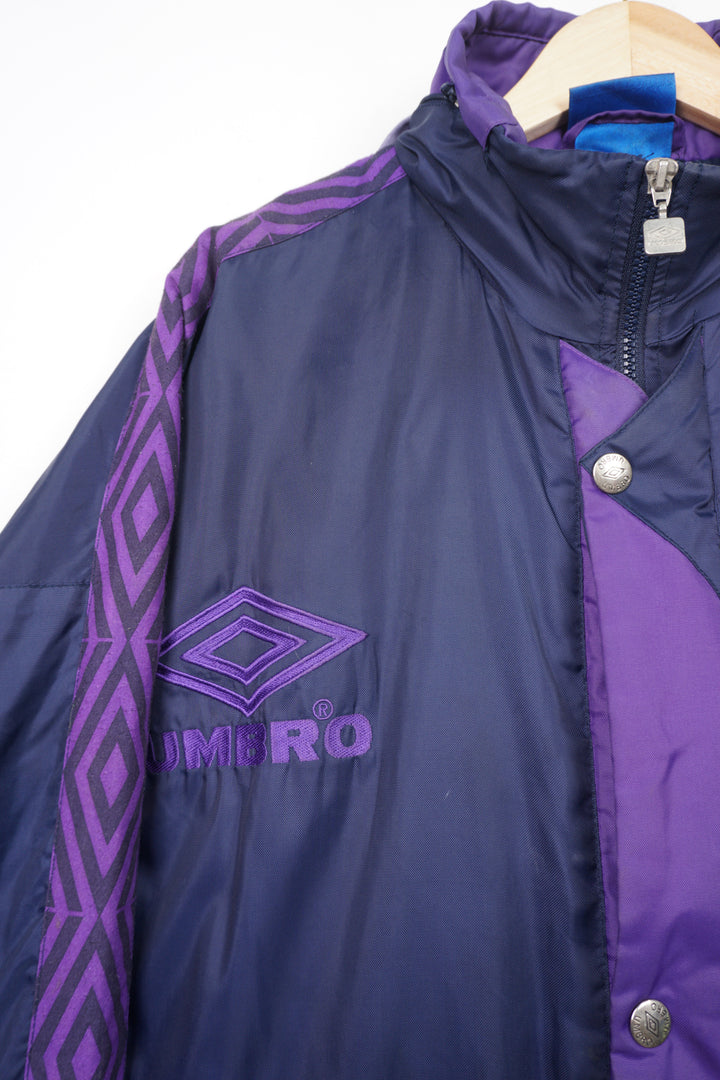 Vintage purple and navy blue zip through Umbro coat with embroidered logo on the chest and foldaway hood