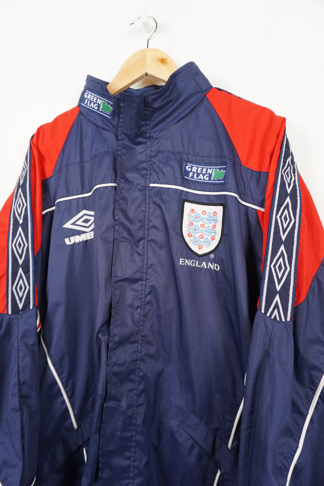 Vintage 1996/98 England training lightweight jacket by Umbro, ribbon details on the shoulders, foldaway hood and embroidered badge on the chest