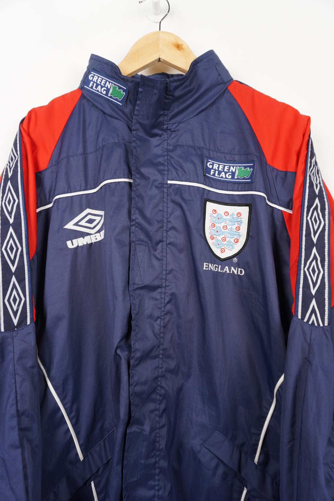 Vintage 1996/98 England training lightweight jacket by Umbro, ribbon details on the shoulders, foldaway hood and embroidered badge on the chest