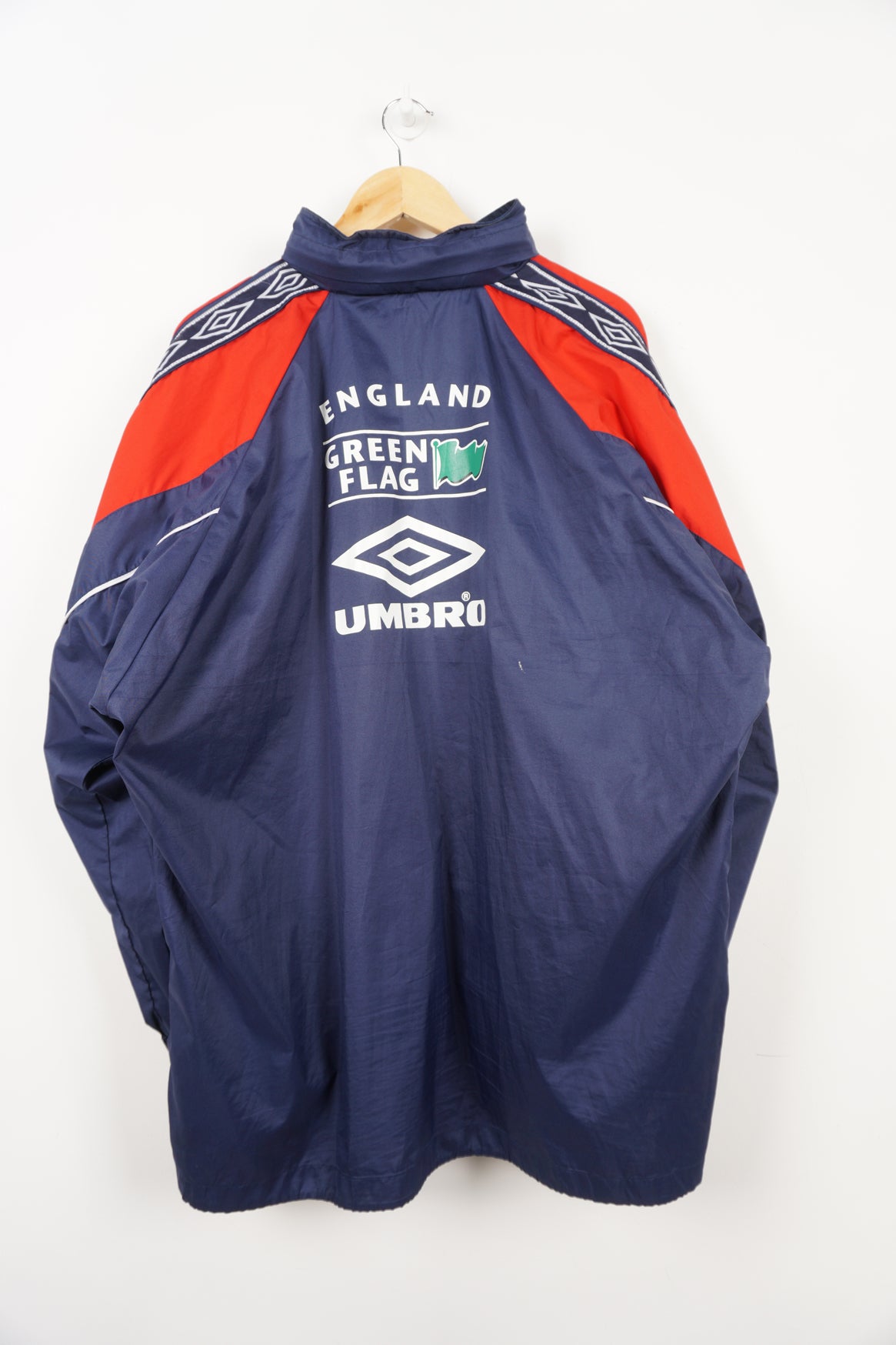 Vintage 1996/98 England training lightweight jacket by Umbro, ribbon details on the shoulders, foldaway hood and embroidered badge on the chest