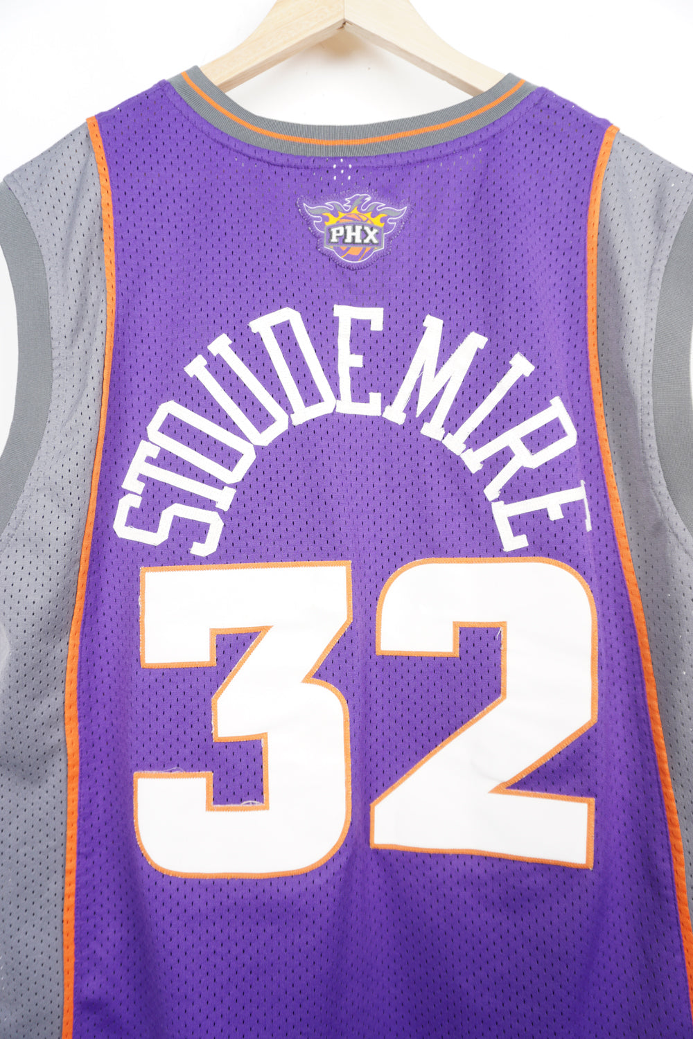 #32 Amare Stoudemire purple Pheonix Suns NBA / Reebok jersey with embroidered lettering